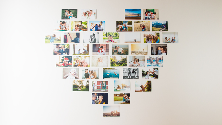 Arrange photos in shape of a heart on the wall