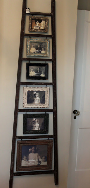 Use an old ladder as a photo display