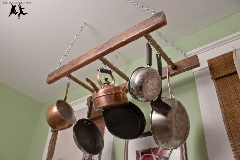 Turn an old ladder into a pot rack