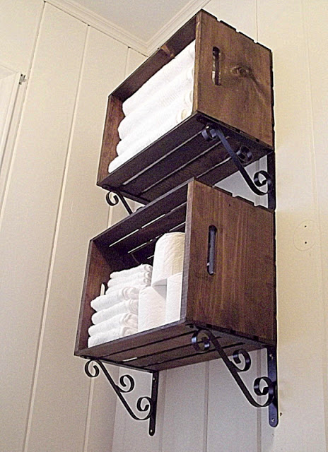 Create a wall storage with wooden crates