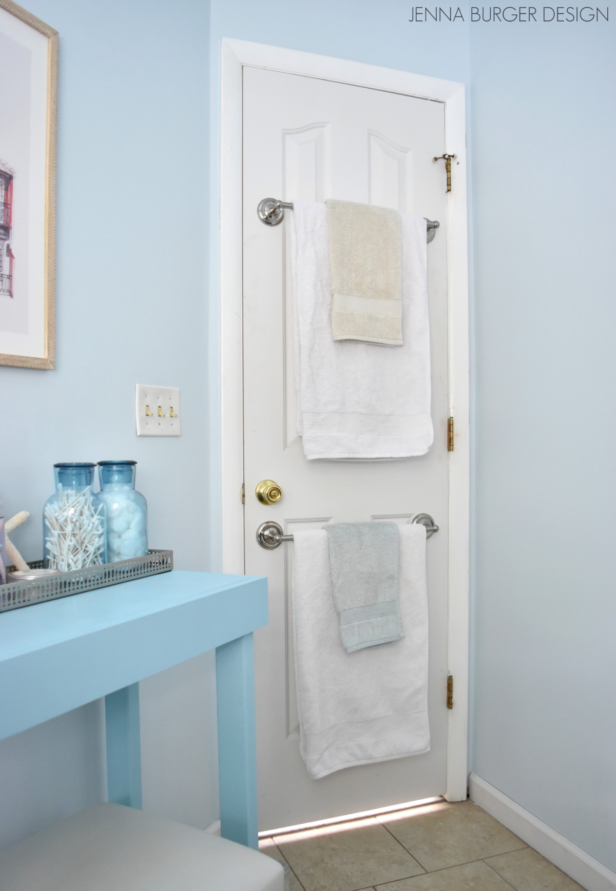  Install multiple towel rods on the back of your door