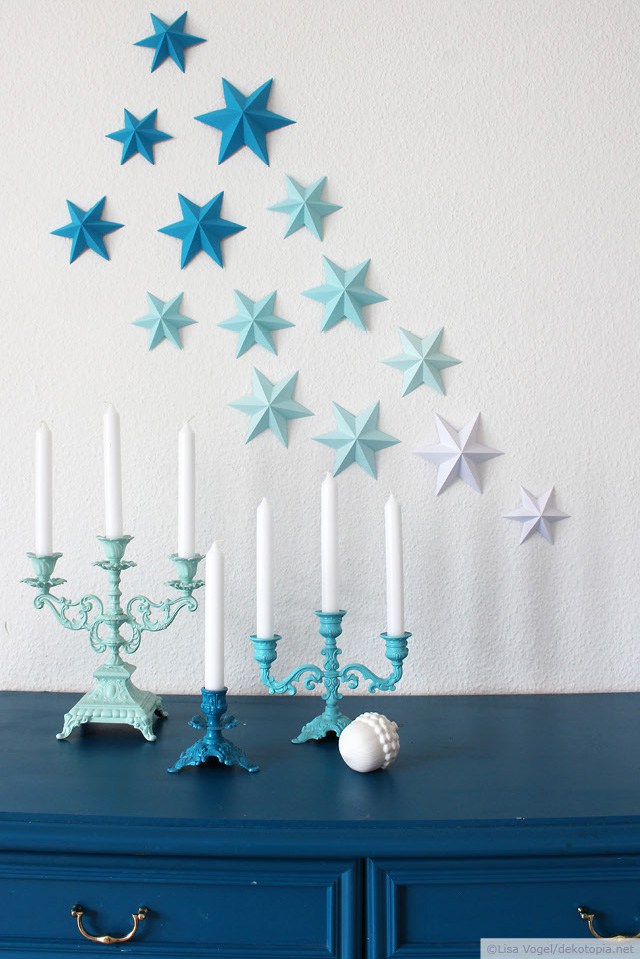 Make these 3D paper stars to decorate your wall