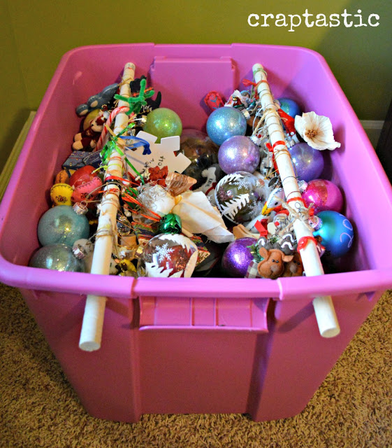 Organize ornaments with a large tub and a couple rods