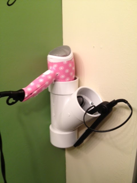 PVC pipe also makes a super handy place to store your hair dryer and curling iron or flat iron
