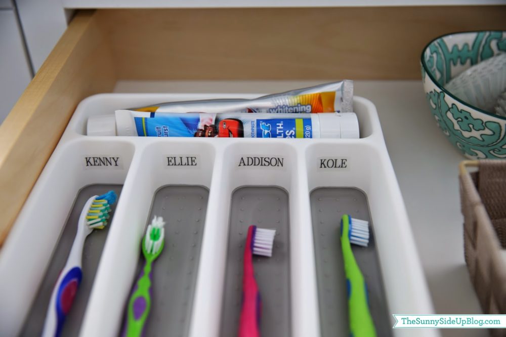Use a silverware tray to organize your toothbrushes and other dental products