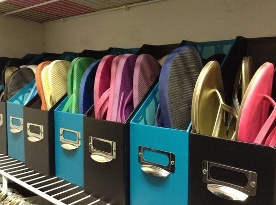 Use old magazine holders to store flip flops and sandals