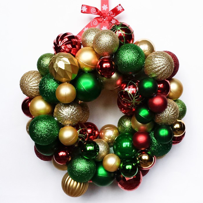 festive Christmas ornament wreath using supplies from the Dollar Tree