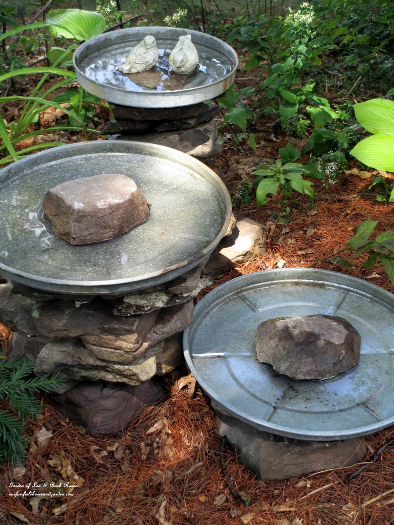 Birdbath made with large galvanized pan and rocks