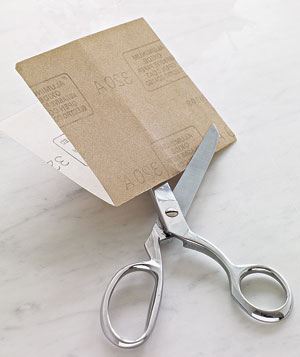 To sharpen scissors, simply cut through sandpaper