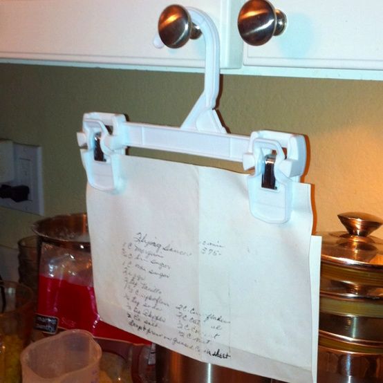 Use a hanger with clips to hold your recipes