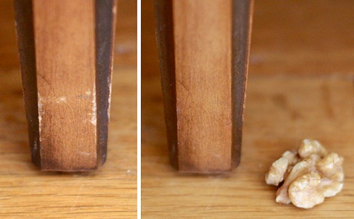Use a walnut to cover up scratches on wooden furniture