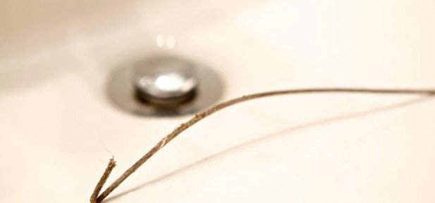 Clear Your Clogged Drain With a Wire Coat Hanger