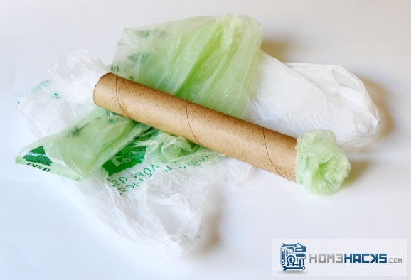 Store small plastic bags in an empty paper towel tube